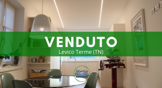 PRESTIGIOSO APPARTAMENTO IN CENTRO  A LEVICO CON CORTILE INTERNO