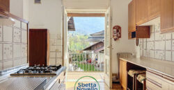 APPARTAMENTO CON TERRAZZO, GIARDINO E POSTI AUTO