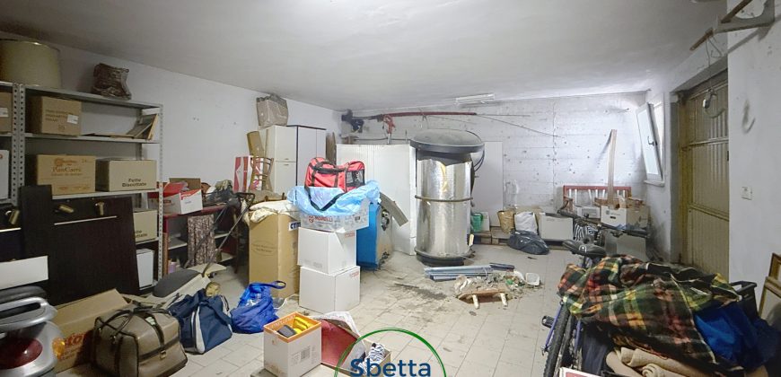 APPARTAMENTO CON GIARDINO E GARAGE