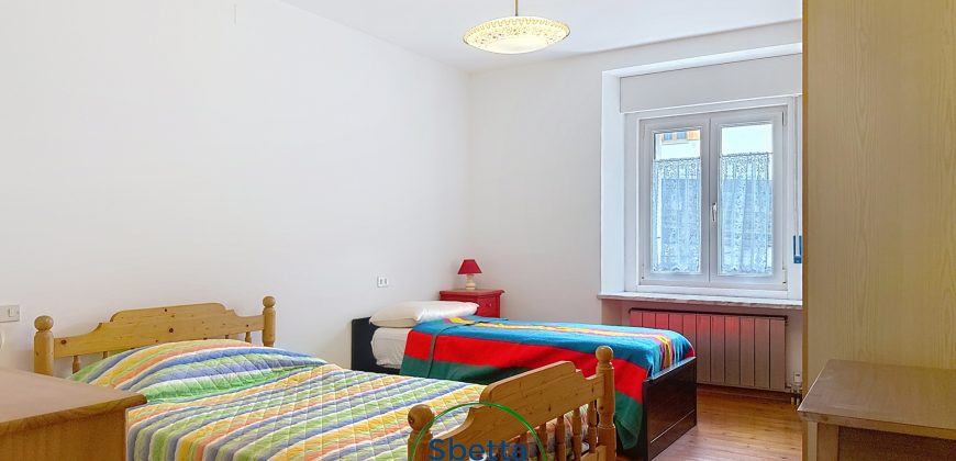 APPARTAMENTO CON GIARDINO E GARAGE