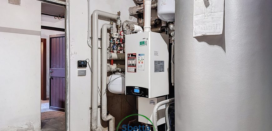 APPARTAMENTO CON GIARDINO E GARAGE