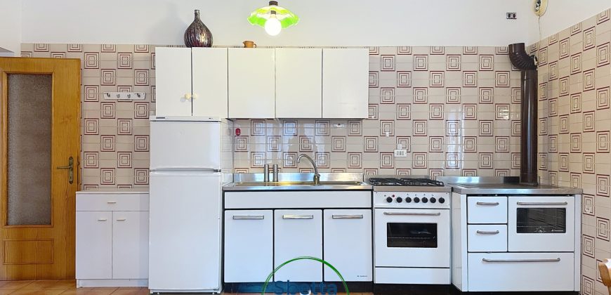 APPARTAMENTO CON GIARDINO E GARAGE