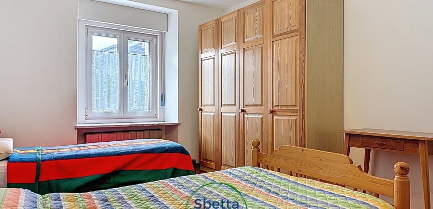 APPARTAMENTO CON GIARDINO E GARAGE